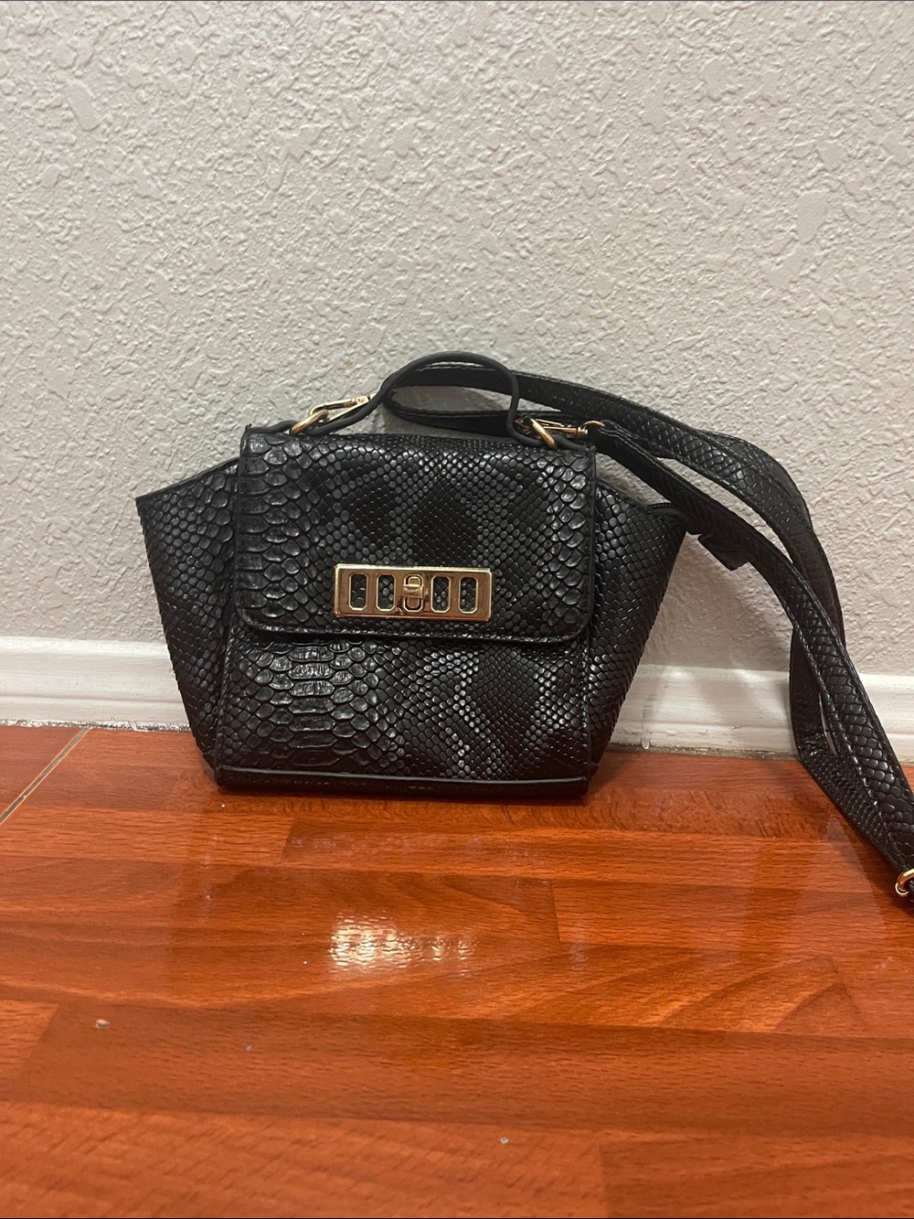 Black Faux Snakeskin Crossbody Bag with Gold Accent